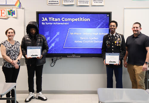 Joleen Hanlon, Kelsey Gourick-Sistrunk, Bekim Spellen and Chris Austen posing for a photo