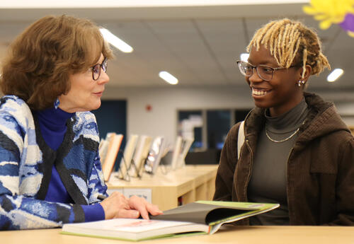 Student getting a copy of Jarrow's book signed by the author