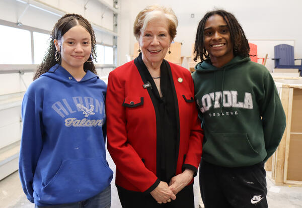 Commissioner Reardon with two construction technology students