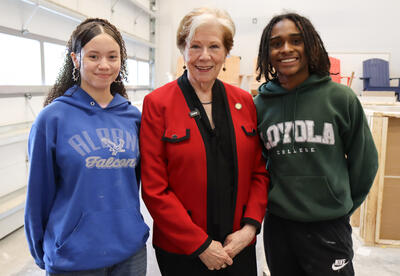 Commissioner Reardon with two construction technology students