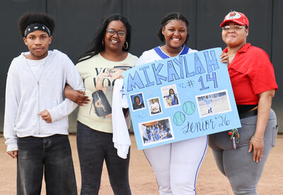 Mi'Kaylah Sturgis-Jones with loved ones at senior night