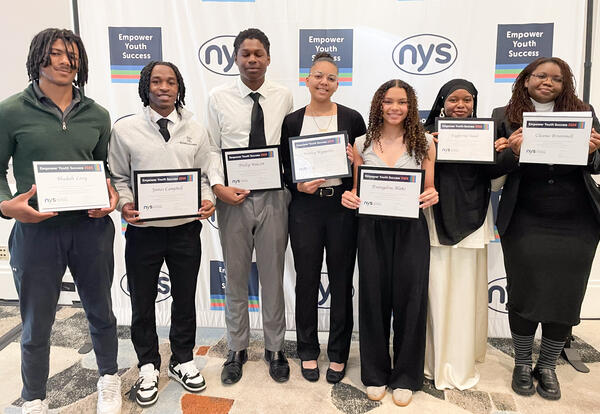 Group photo of Yehudah Levi, James Campbell, Marley Hyppolite, Phillip Walcott, Evangeline Blake, Suad Fagbenro, and Cleana Brummell