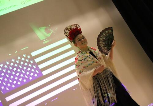 A student performs at a multicultural festival.