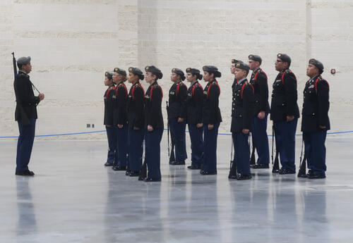 Photo of cadets in uniform competing