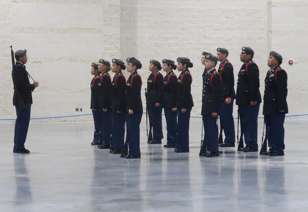 Photo of cadets in uniform competing