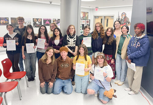 New inductees with certificates and returning club members