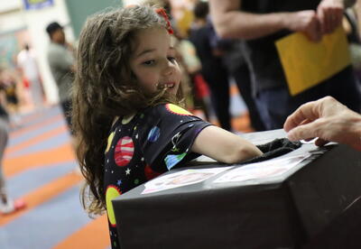 A student participates in a science activity.