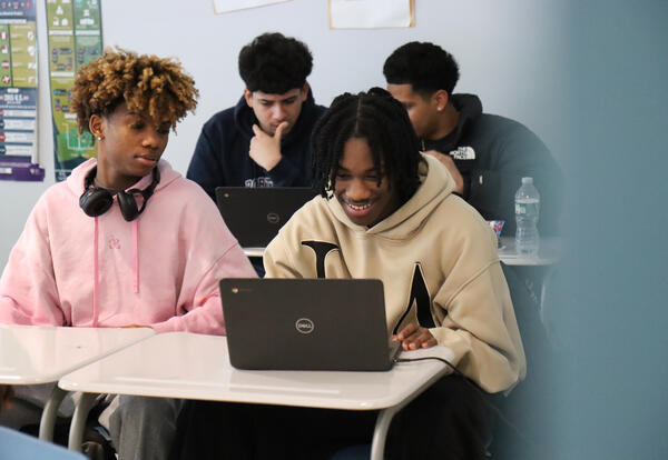 Students working on Chromebook