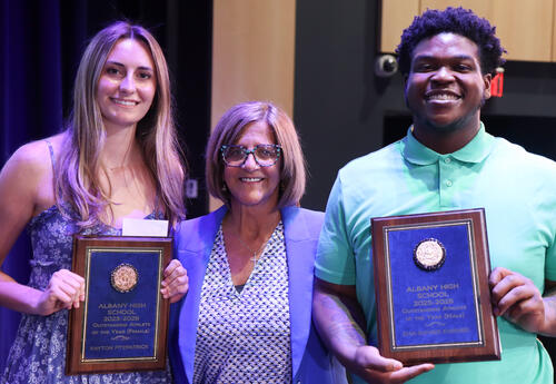 Photo of Payton Fitzpatrick, Kimberly Pilla and Kha'Davier Farmer at ceremony