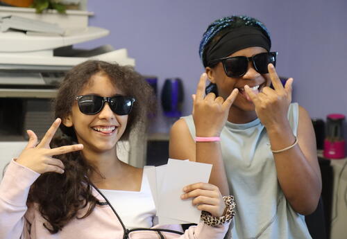 Students conduct research on classic rock bands.