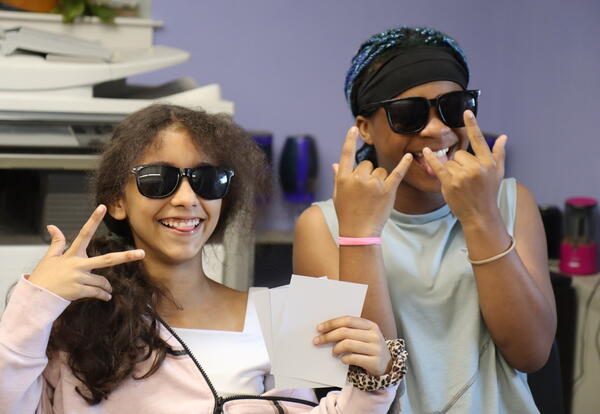 Students conduct research on classic rock bands.