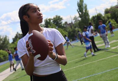 A quarterback prepares to throw a football.