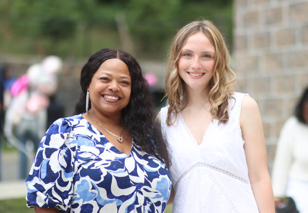 North Albany valedictorian posing with Principal Piper