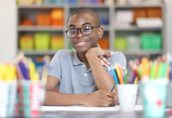 Student working at an art desk
