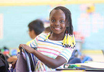 Student smiling in class