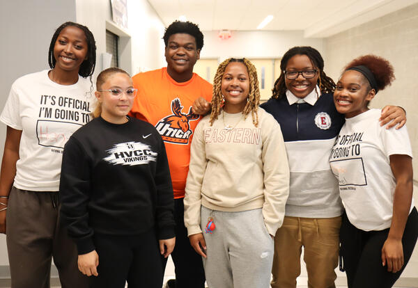 Group of Albany High students wearing college t-shirts