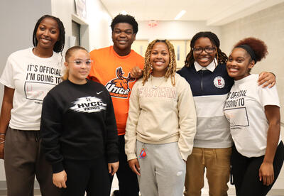 Group of Albany High students wearing college t-shirts