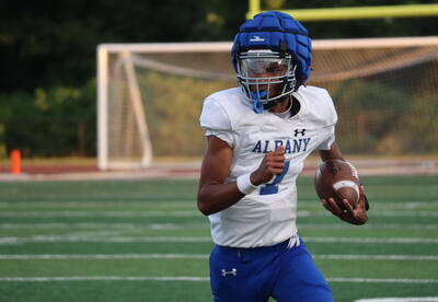 Photo of Albany High football player on the turf