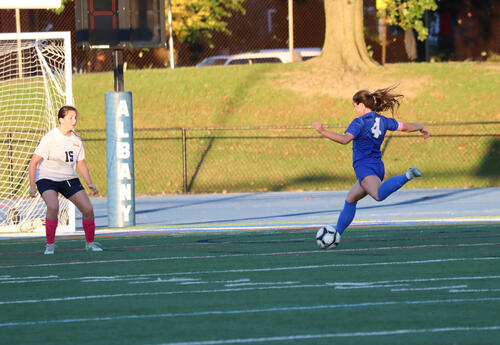 Amani Waxman kicking a goal