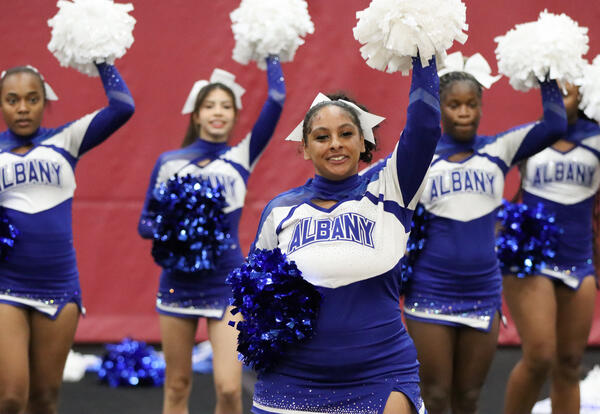 Cheerleading team competing