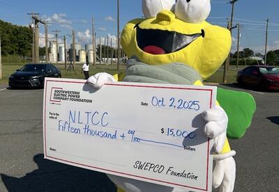 SWEPCO mascot posing