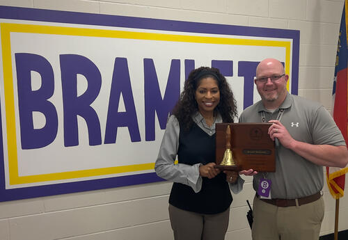 counselor and principal with the award