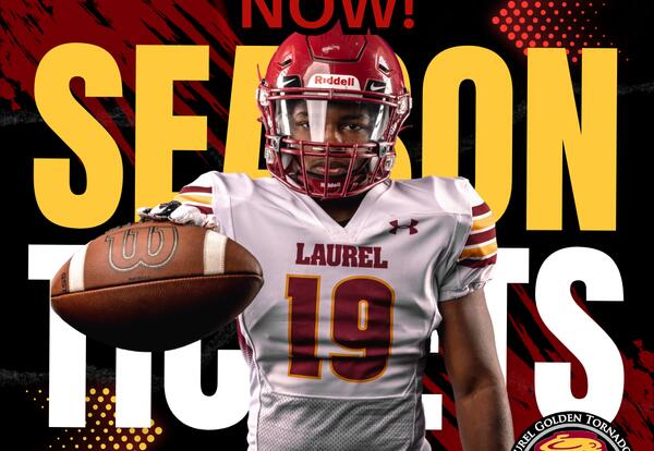 Football Player holding a football promoting season tickets
