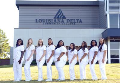 Class posed in front of LDCC Ruston Building.