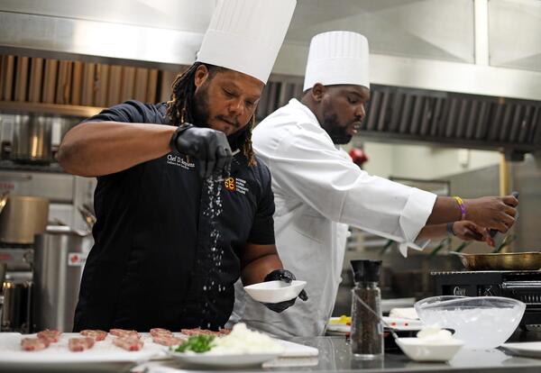chefs working in kitchen