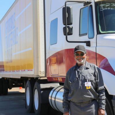 CDL Instructor standing in front of the truck