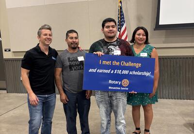 Aldo Vidal accepts his scholarship
