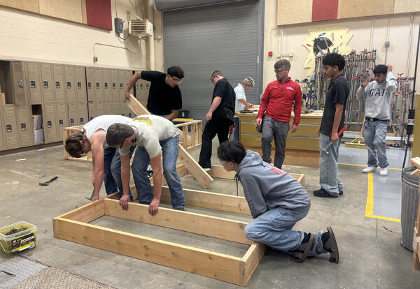 Construction Foundations instructor Eric Duffey helps students apply classroom learning to real-world building projects.