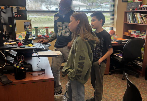 Sixth graders Zayid Padilla-Morales and Adelyn Caouette help record morning announcements for Grant Elementary, sharing schoolwide events, menu options, and reminders. “Good morning, Grant! I’m Zayid and this is my co-host, Adelyn,” the pair recently shar