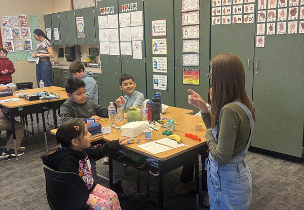 ASL interpreter Rebekah Homer signs during class at Clovis Point Elementary, helping ensure a student who is deaf or hard of hearing can access instruction alongside classmates.