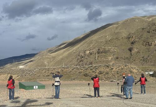 Eastmont students practice trap shooting at the Wenatchee Gun Club during a weekly team practice led by coach Jeff Hepton.