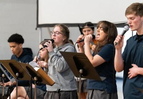 Students Worshipping the Lord