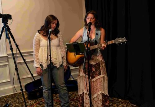 Girls Singing and Playing Guitar