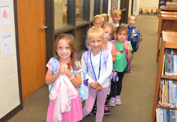 Kindergarten students in line in hallway