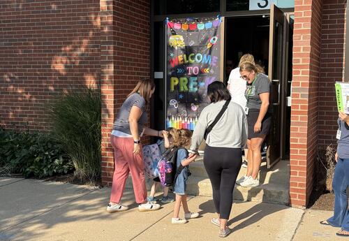 students arriving to preschool