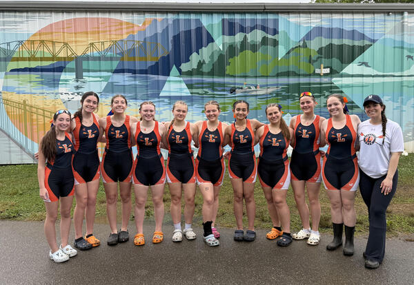 Pictured with Coach Eustace are coxswain Graciella Owens and rowers Danielle Decker, Avery Crandall, Natalie Thompson, Krystyna Chybinski, Gabriella Bigness, Rio Feliciano, Liza Morton, Julianna Ross and Addyson Gaudet.