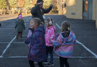 Marcus dancing with students