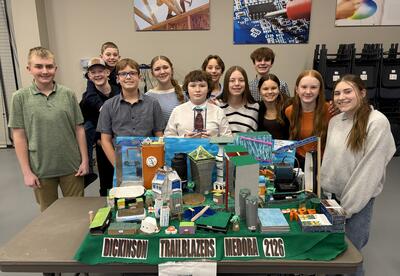 Dickinson Middle School students in front of their physical model