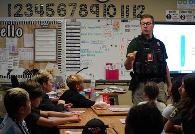 SRO Jarett Blain speaking during DARE class