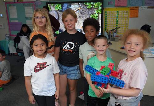 Group of students posed with STEM Creation
