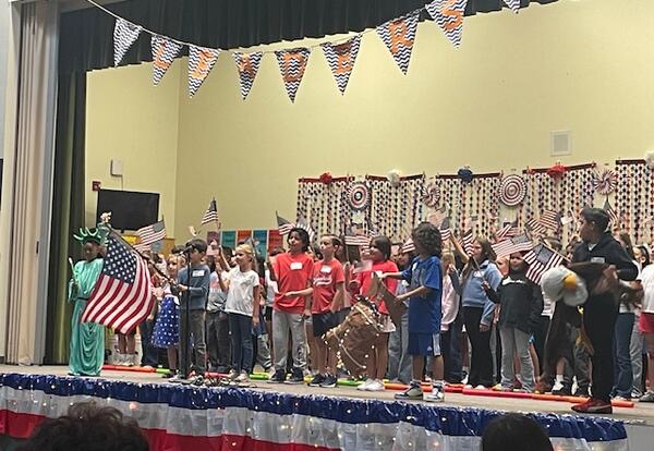 Children performing in a 3rd Grade Musical