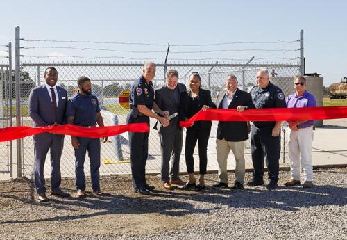 Louisiana DPS Principal Assisistant, Chief Bryan J. Adams and ExxonMobil Pipeline Company Public and Stakeholder Engagement Lead Michael Smith cut the ribbon to unveil the CO₂ pipeline training prop.