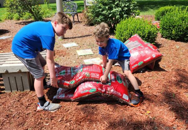 Sward Students and Cub Scouts Help Keep Sward's Garden Beautiful