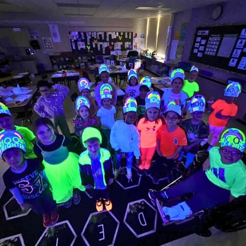 Class Picture under glowing black lights
