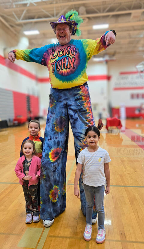 Students with Stilts Performer