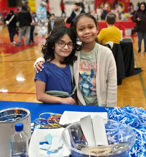 Two Girls Smiling for the camera